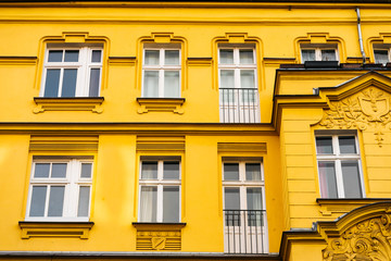Fototapeta na wymiar detailed view of yellow residential facade