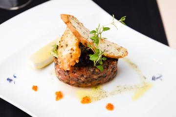 Salmon tartar with red caviar