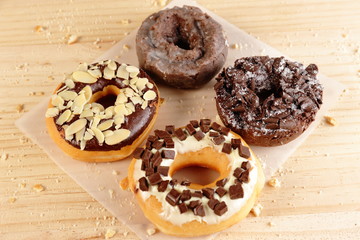 Donuts on wooden background