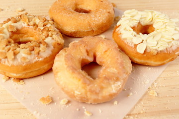 Donuts on wooden background