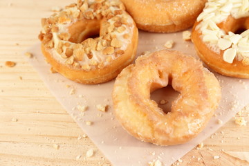 Donuts on wooden background
