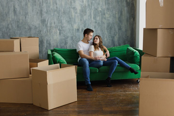 Young couple very happy and excited about moving into new apartment