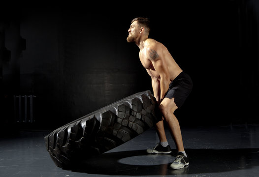 Crossfit Training - Man Flipping Tire