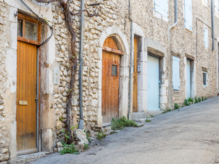 Fototapeta na wymiar Traditional old classic buildings architecture, doors in countryside area of France