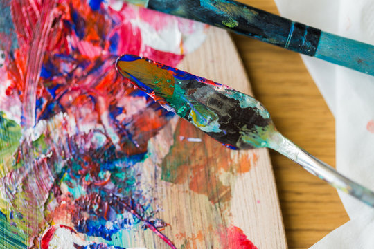 palette knife or painting spatula and paintbrush