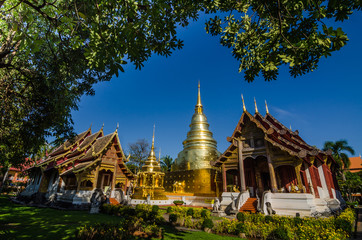Naklejka premium Old Church and golden pagoda at phra singh temple