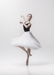 Fototapeta premium Young classical dancer isolated on white background.