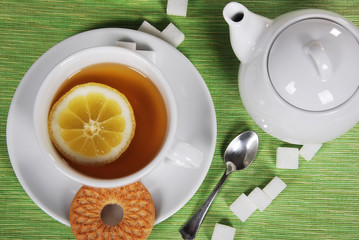 fruit tea with a cookie in white porcelain