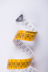 Measuring tape on white background. Isolated.