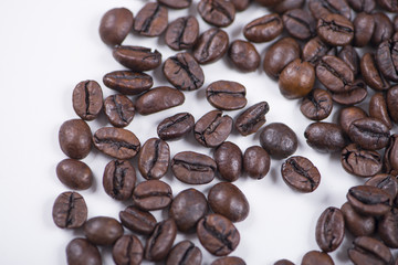 Background of of coffee beans on white background. Isolated.