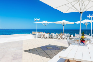 Fototapeta na wymiar Beautiful cafe on the beach, Crete island, Greece.