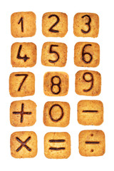 Square cookies with chocolate numerals on them isolated on white background. Figures from zero to nine. Flat lay.