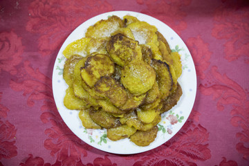 Bread toast with red wine, traditional Portuguese food, Christmas night.