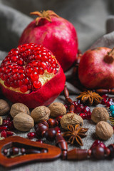 Juicy aromatic pomegranate on the table.