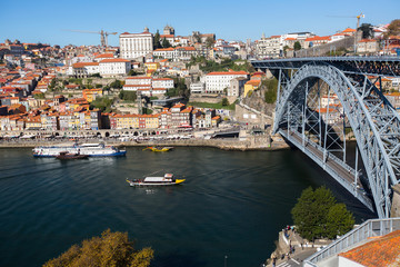 Fototapeta na wymiar Dom Luis I bridge, Douro river and Ribeira from Vila Nova de Gaia, Porto, Portugal.