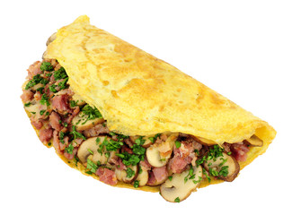 Mushroom and bacon omelette folded in half isolated on a white background