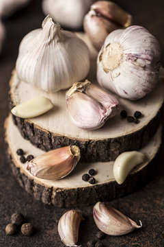 Fresh garlic on wooden background. Garlic bulbs