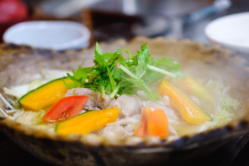 Food steaming in clay pot