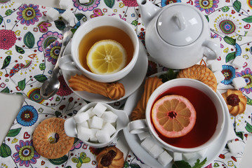 hot tea from dried fruit with lemon and honey on a  serviette