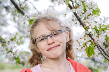 portrait of girl under flowers