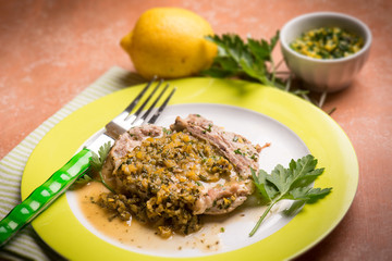 meat with gremolada traditional italian recipe, selective focus