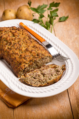meatloaf with potatoes and parsley, selective focus
