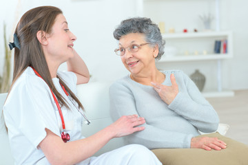 Obraz premium picture of a happy senior woman with her caregiver