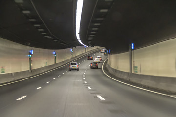 illuminated highway tunnel