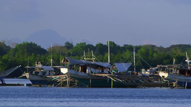 Large Jukung Boats; Around Puerto Princesa; Puerto Princesa, Palawan, Philippines, Asia