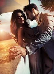 Poster Im Rahmen Handsome, elegant man kissing his beloved girlfriend © konradbak