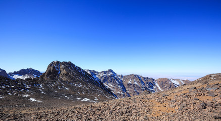 High Atlas Mountains. Walking hiking trail. Morocco, winter. Wild nature landscape.