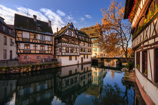 Beautiful views of historic city of Strasbourg and river Ill. Traditional half-timbered houses in Alsace. France.