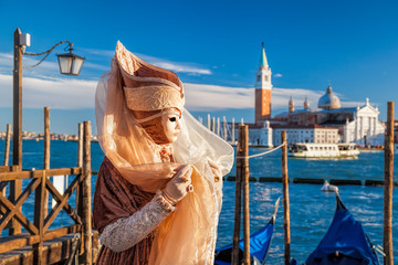 Colorful carnival masks at a traditional festival in Venice, Italy