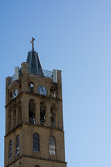 Fototapeta na wymiar Close Up of the Bell Tower of the Church of Santa Maria La Nova. Pulsano, South of Italy