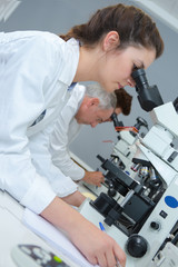 female scientist doing research in the genetics laboratory