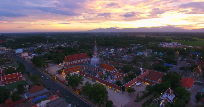 4K Aerial Movie of Ancient pagoda at Nakornsri thammarat in Sunset Scene, Thailand
