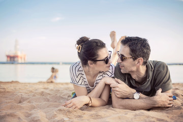 Romantic couple relaxing on a beach