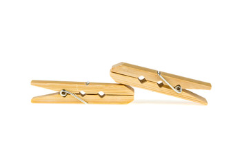 two clothespins of bamboo on a white background