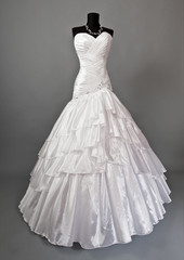 Fototapeta na wymiar White Wedding dress on a mannequin