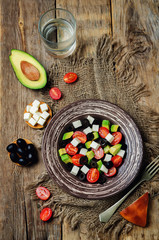 Avocado tomato black olives feta cheese salad