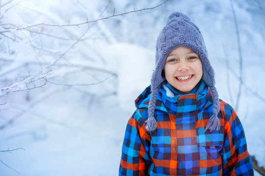 Beautiful Young Boy In Winter Park