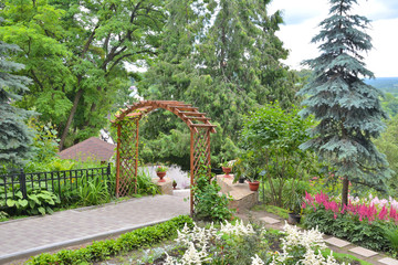Wooden arch for climbing plants in the Park