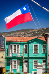 Chilean flag fluttering on a mast in Valparaiso