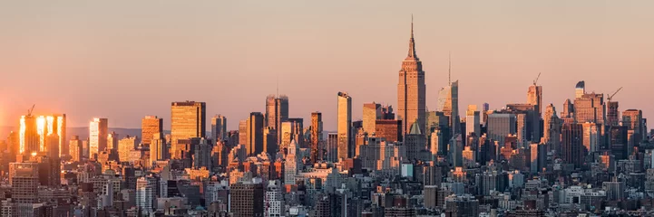 Behangcirkel New York skyline bij zonsondergang met Empire State Building, USA © eyetronic