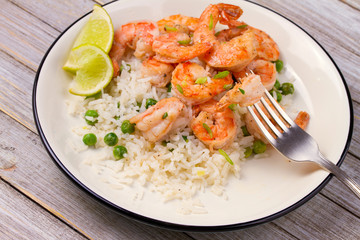 Shrimps with rice and peas. horizontal