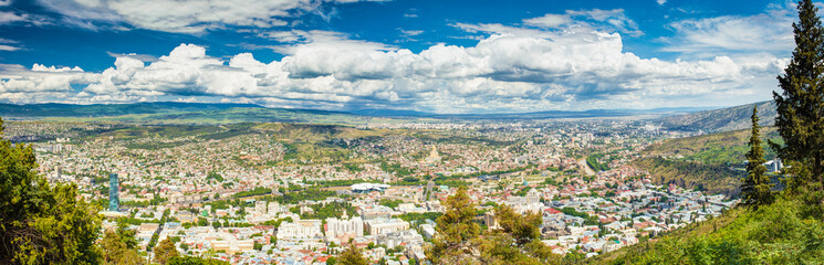 Obraz premium Tbilisi, Georgia. Scenic Aerial View, Panorama, Cityscape With Beautiful Blue Sunny Sky