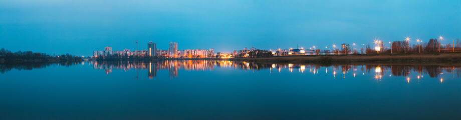 Obraz premium Panorama Of Urban Residential Area Overlooks To City Lake Or River