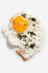 Fried egg on a white background