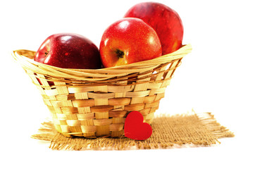 Apples on a limited background in the basket