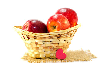 Apples on a limited background in the basket